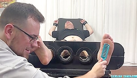 A blonde with a tattooed butt is fucking a guy in a video