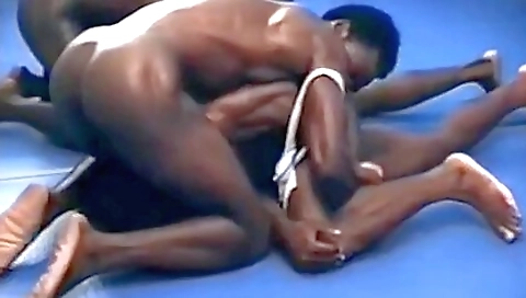 Two guys in black stockings get fucked by a black man