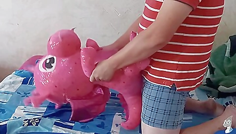 A big black dildo is getting inserted in this brunette 18+ clip
