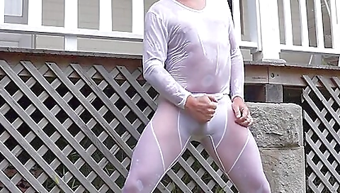 Brunette woman is in a sexy lycra in outdoor scene