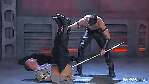 The guy is getting bent and tied up and fucked deep throat